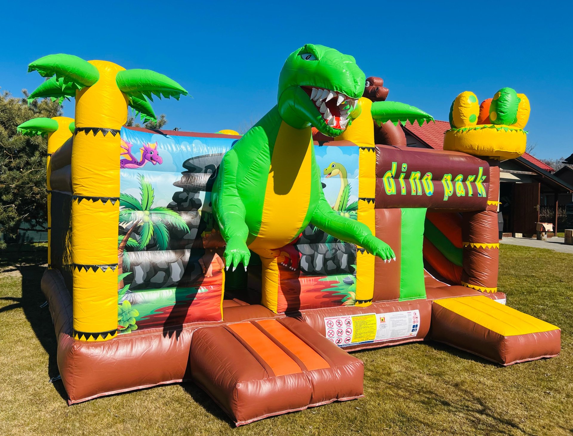 PVC velký skákací hrad včetně skluzavky 6x5m DINO